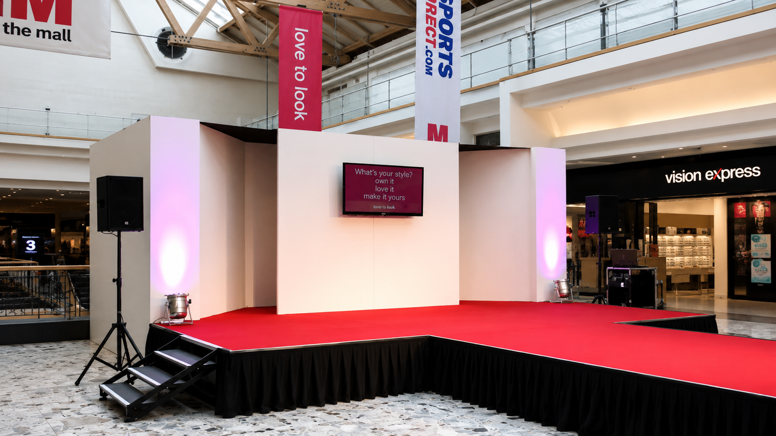 Modular staging with drape fascia & red carpet